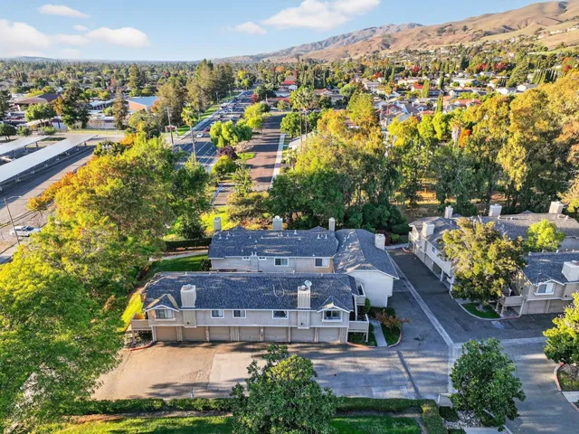 a view of house with yard