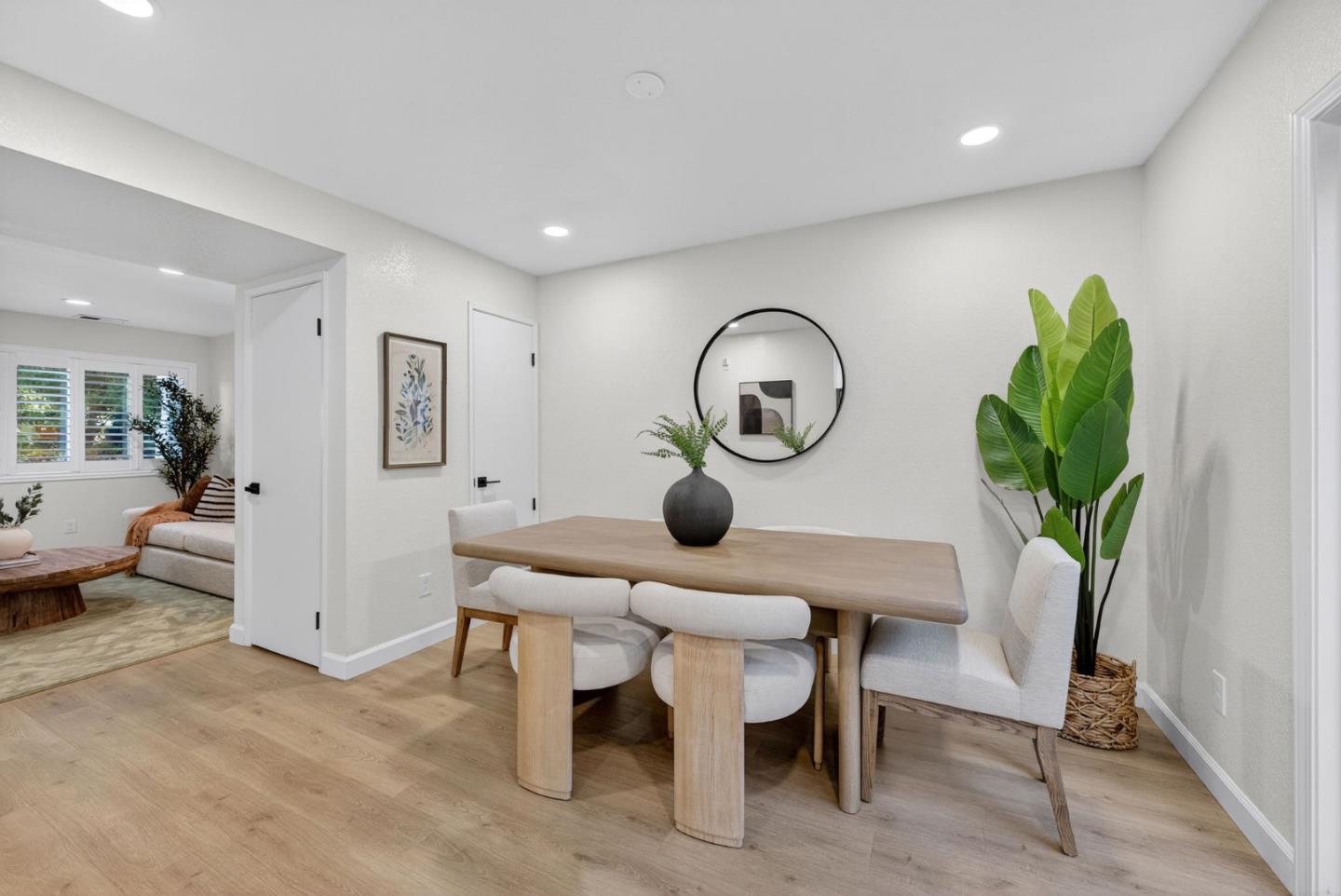 3513 Ivalynn Circle San Jose, CA 95132 - Photo 6 of 46 a view of a dining room with furniture and a clock