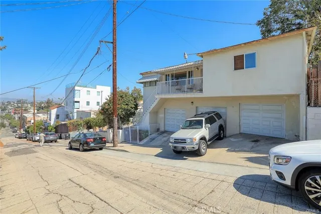 a front view of a house with street