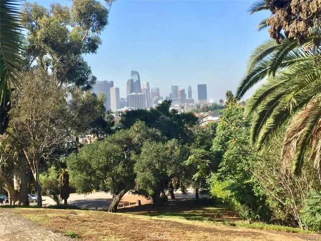 a view of a city with tall buildings