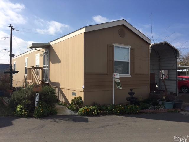50 River Road Isleton, CA 94571 - Photo 1 of 1 a front view of a house with garden