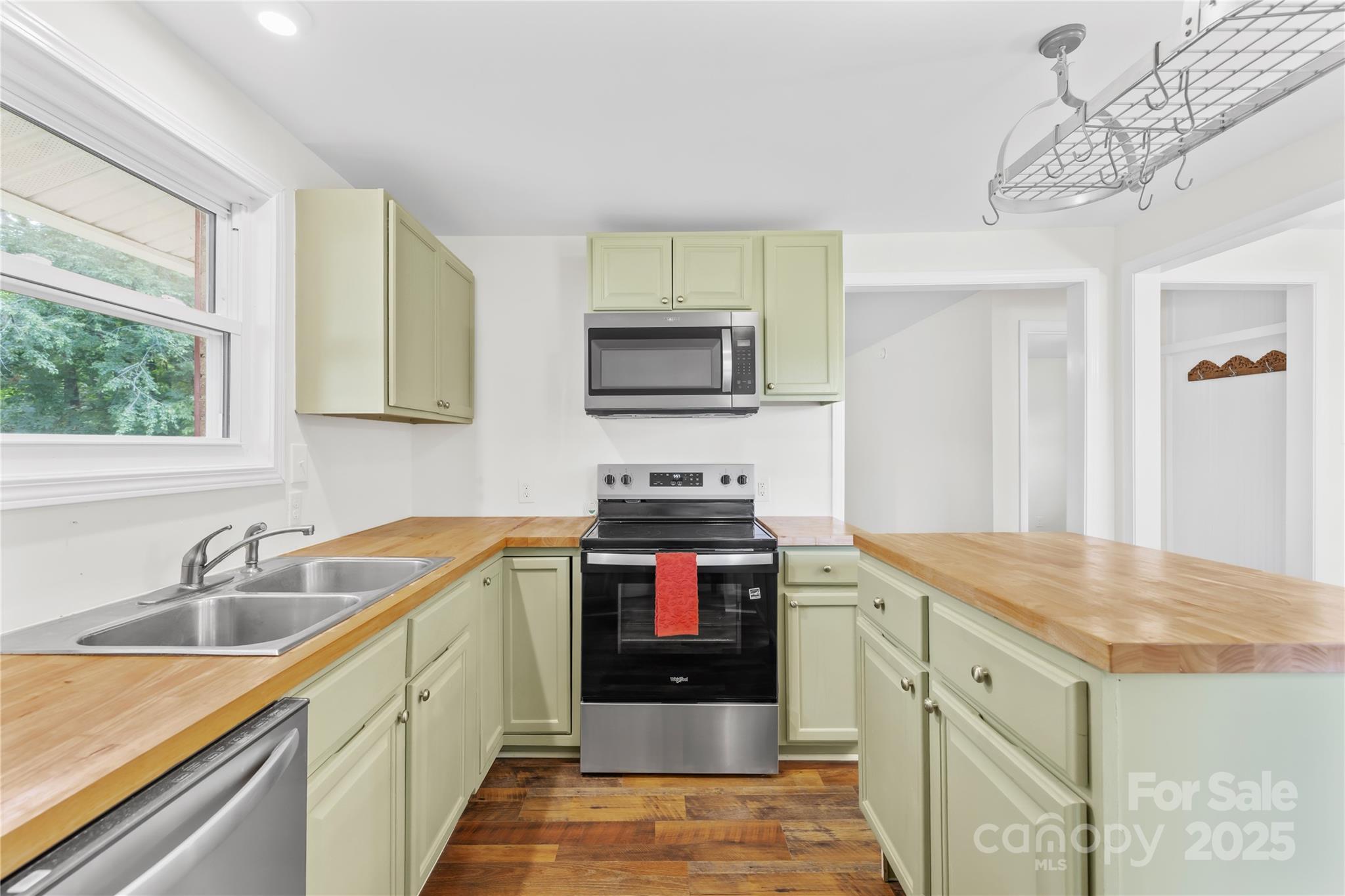 2333 Howells Ferry Road Hickory Grove, SC 29717 - Photo 23 of 30 a kitchen that has a sink and a stove