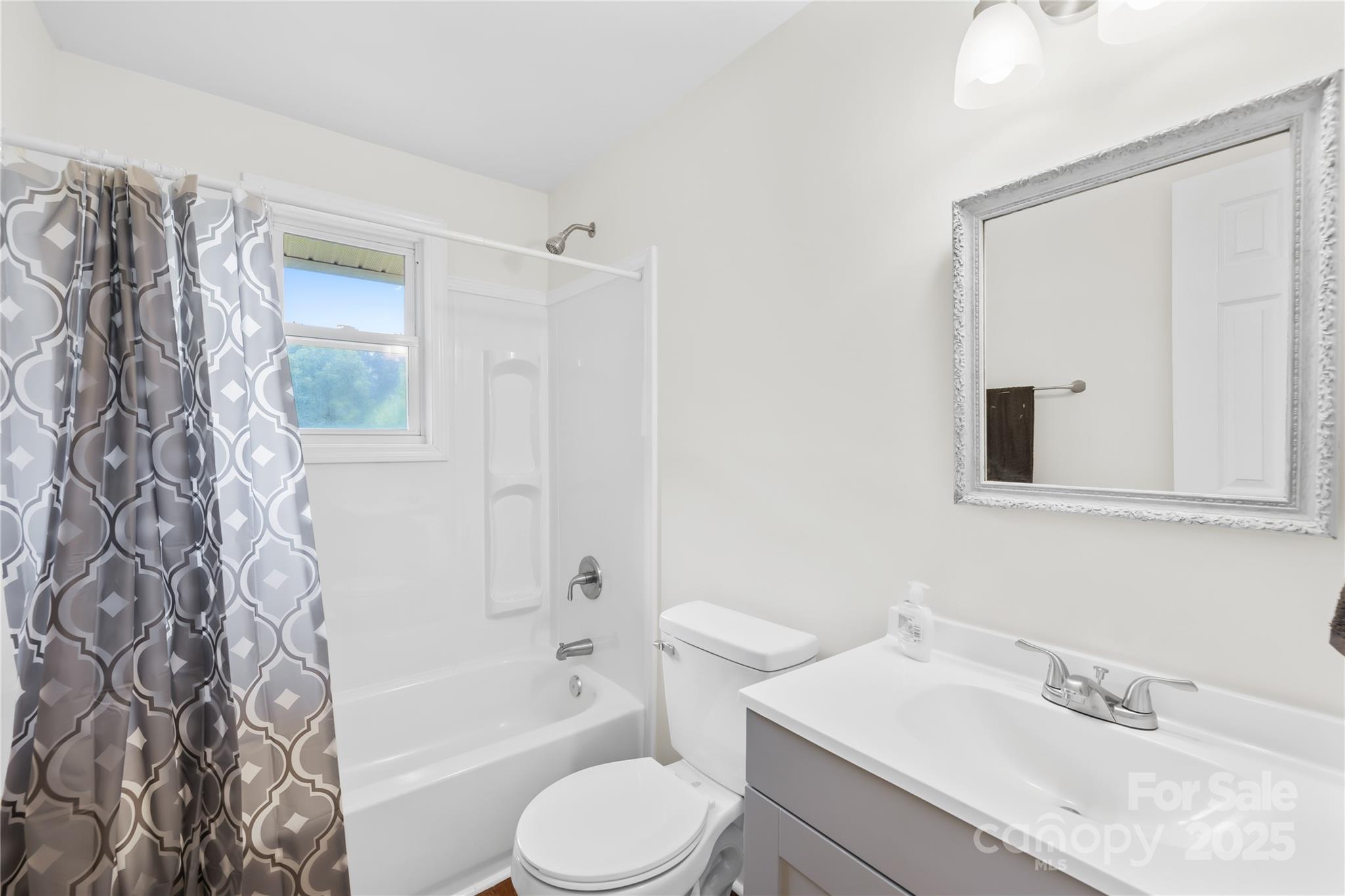2333 Howells Ferry Road Hickory Grove, SC 29717 - Photo 30 of 30 a bathroom with a sink toilet and shower