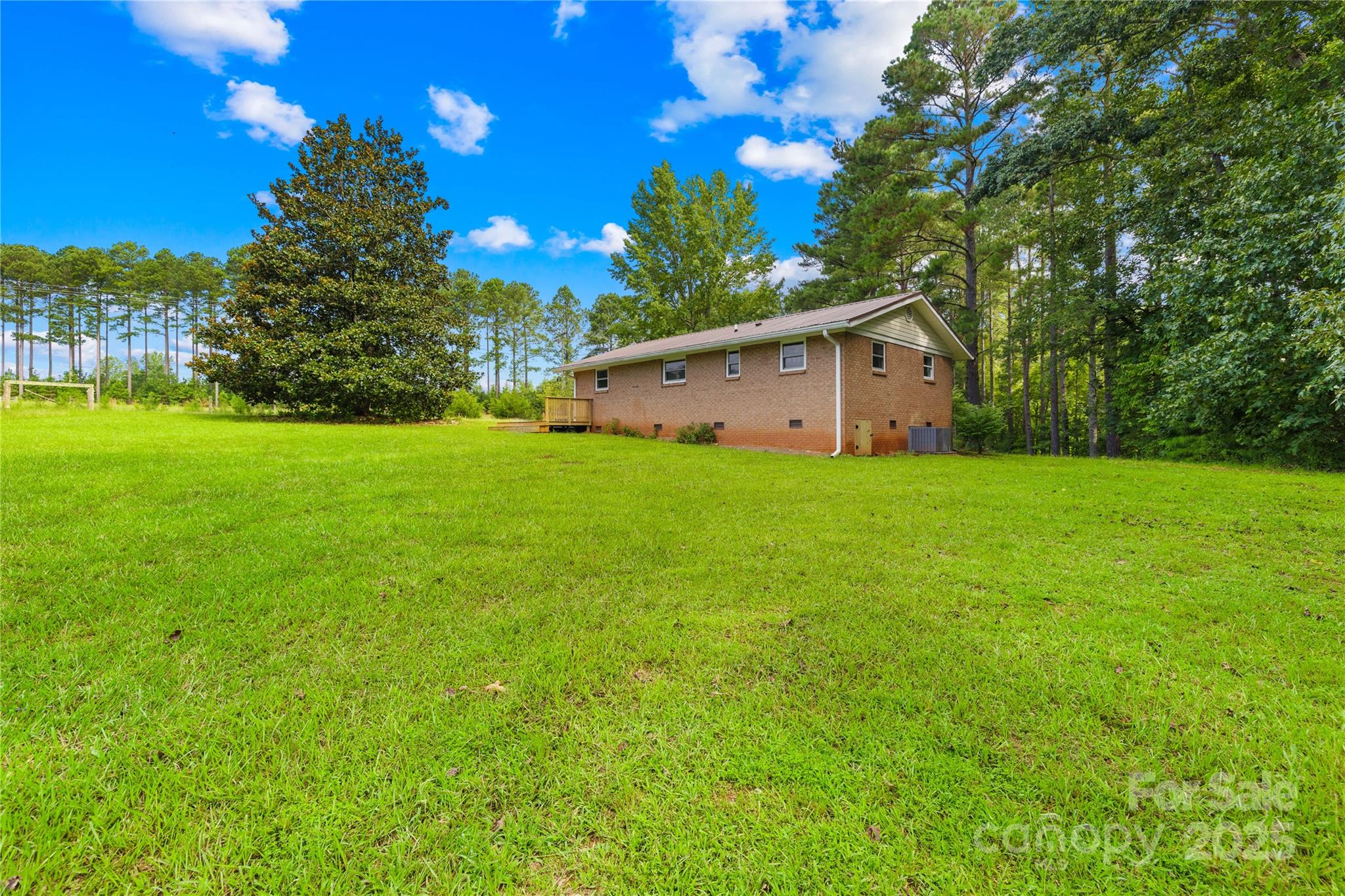 2333 Howells Ferry Road Hickory Grove, SC 29717 - Photo 4 of 30 a view of a backyard with large trees