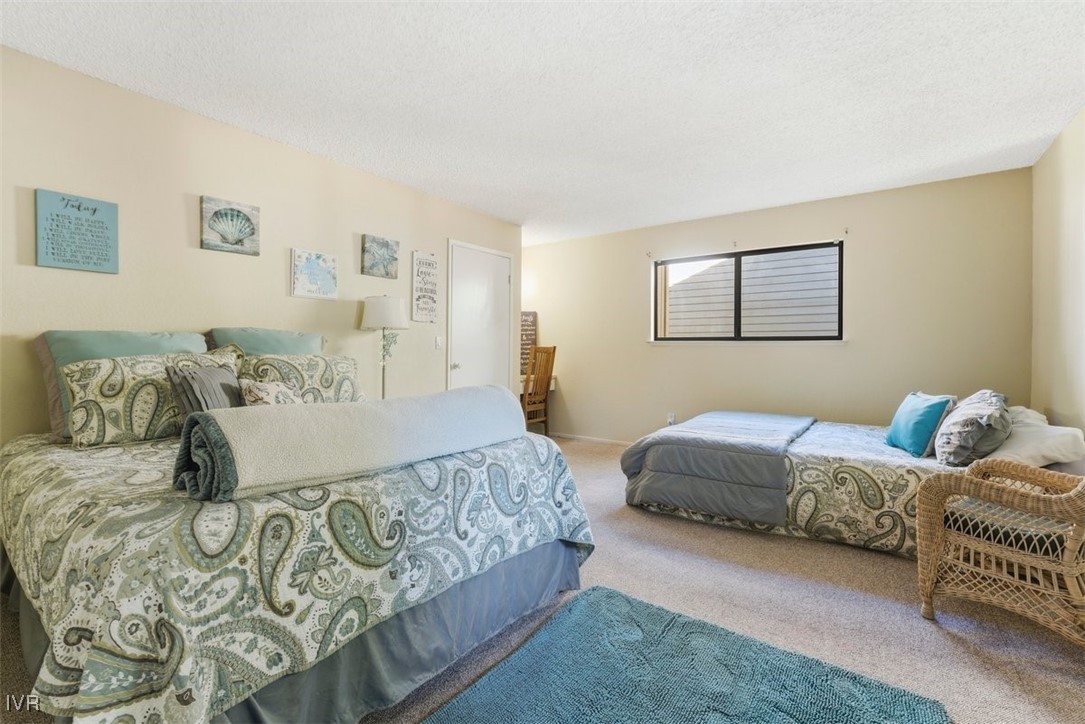 941 Harold Drive Incline Village, NV 89451 - Photo 22 of 27 a bedroom with a bed and couch