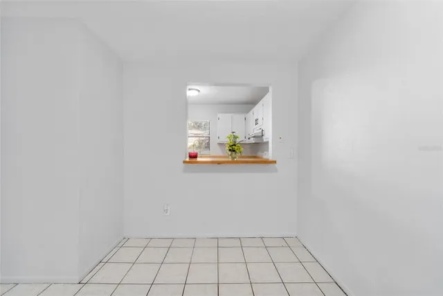 a view of an empty room and window