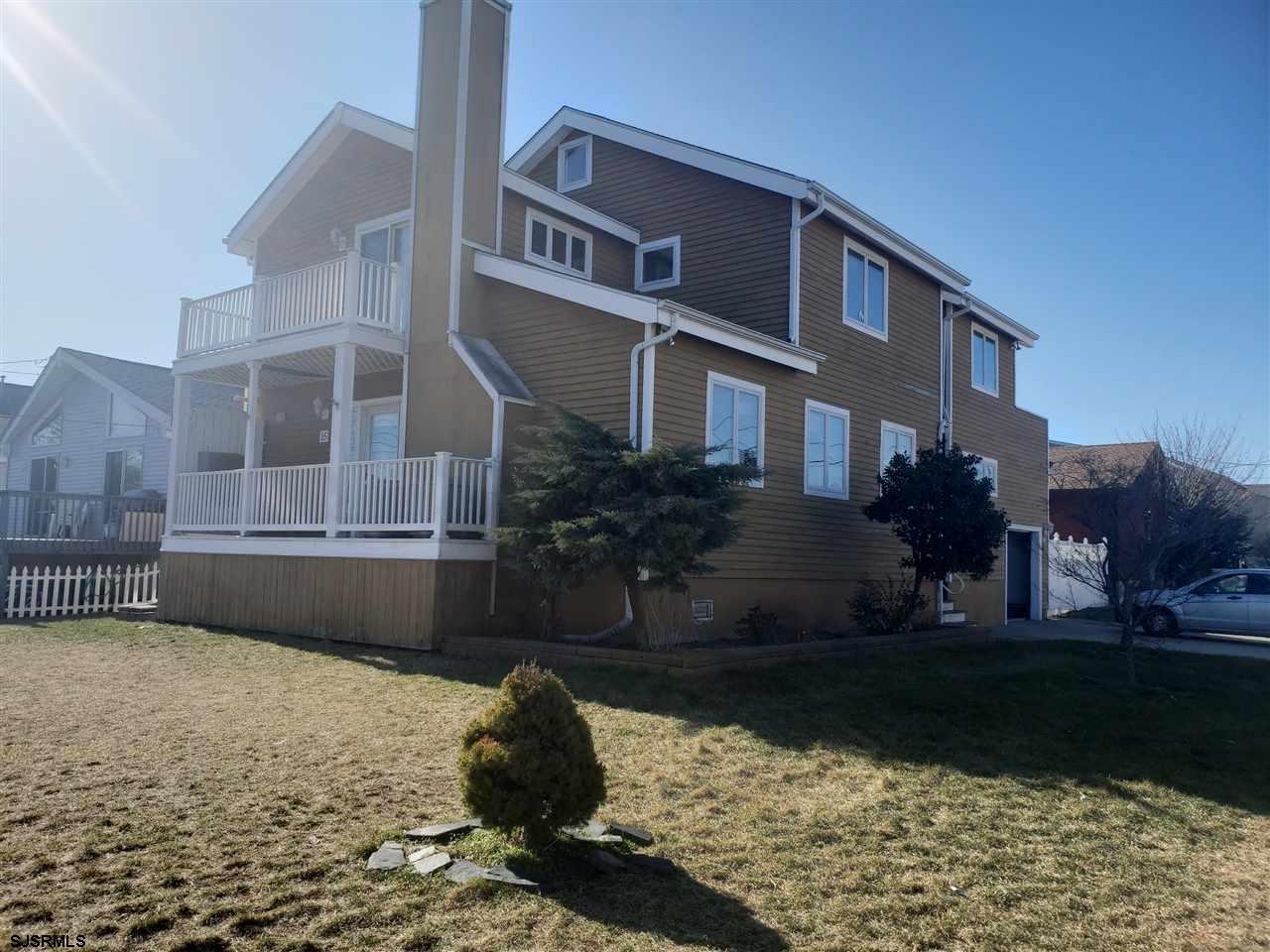 16 Vardon Road Brigantine, NJ 08203 - Photo 1 of 20 a front view of a house with a yard