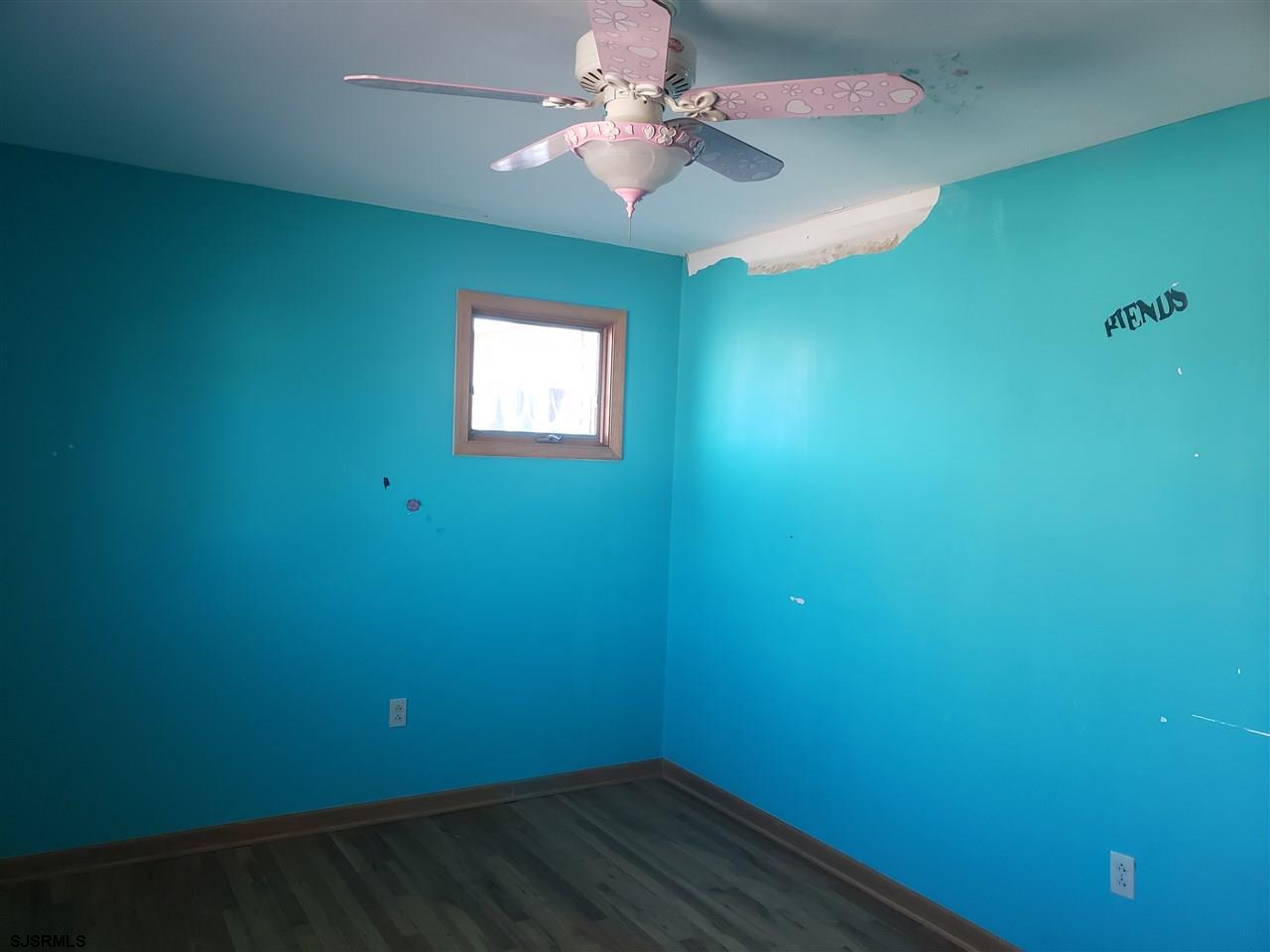 16 Vardon Road Brigantine, NJ 08203 - Photo 12 of 20 a view of a room with a fan and a window
