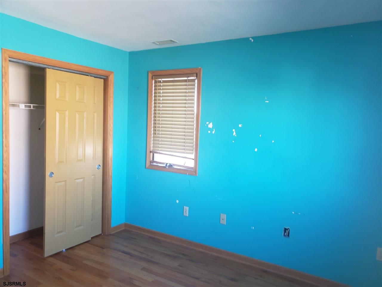 16 Vardon Road Brigantine, NJ 08203 - Photo 13 of 20 a view of an empty room with closet and a window