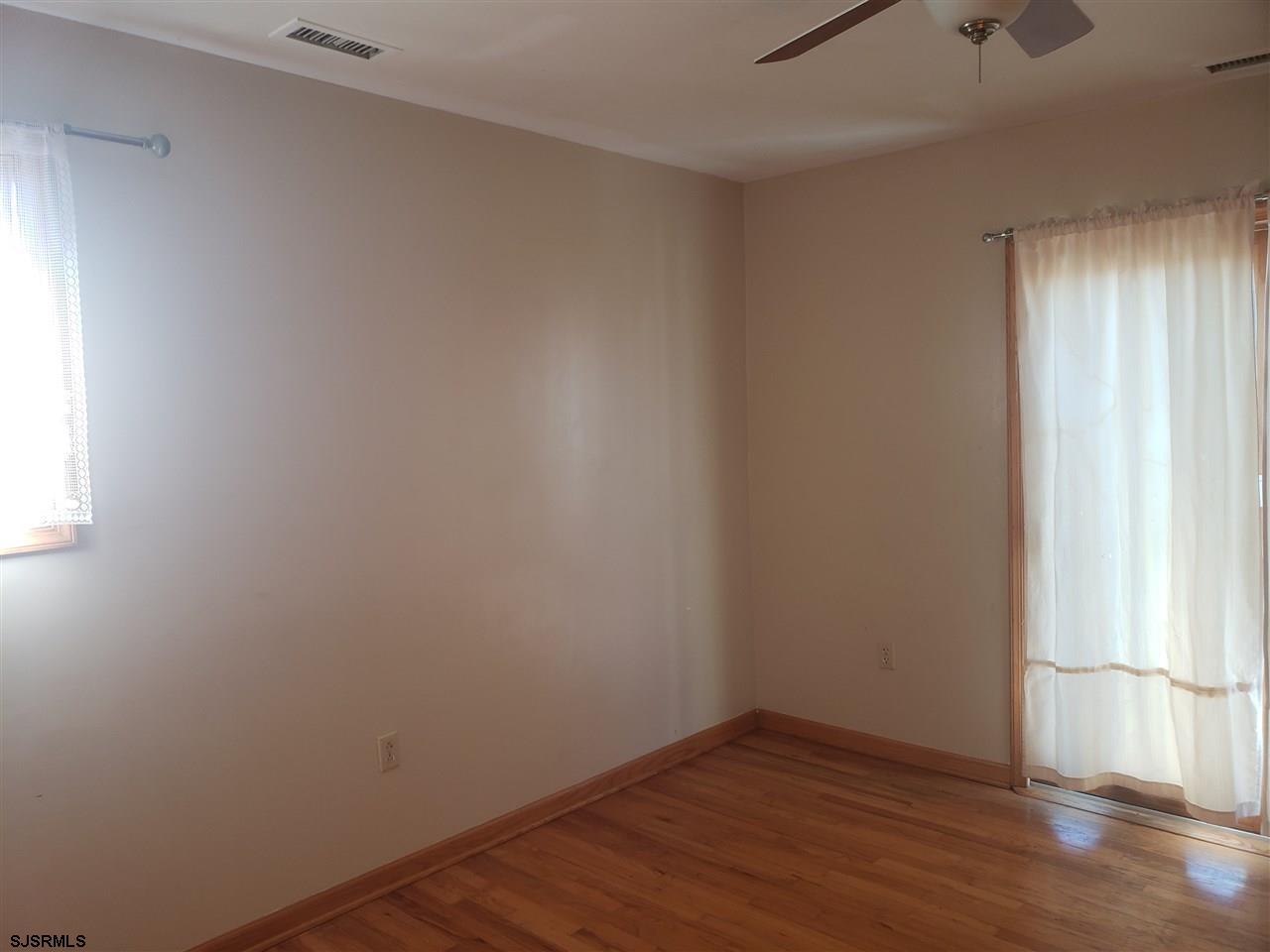 16 Vardon Road Brigantine, NJ 08203 - Photo 14 of 20 a view of a small space with wooden floor and a window