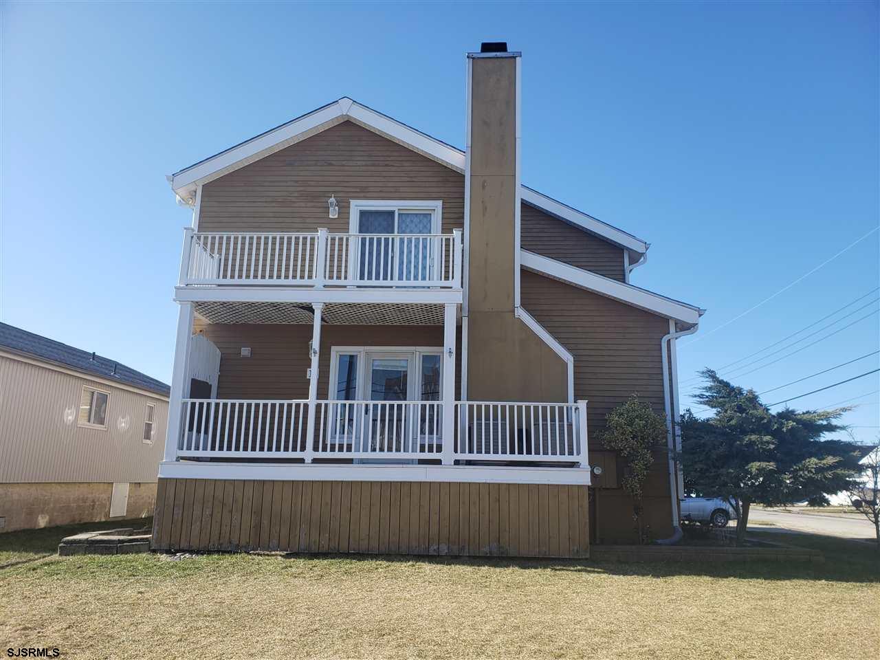 16 Vardon Road Brigantine, NJ 08203 - Photo 2 of 20 a front view of a house with a yard