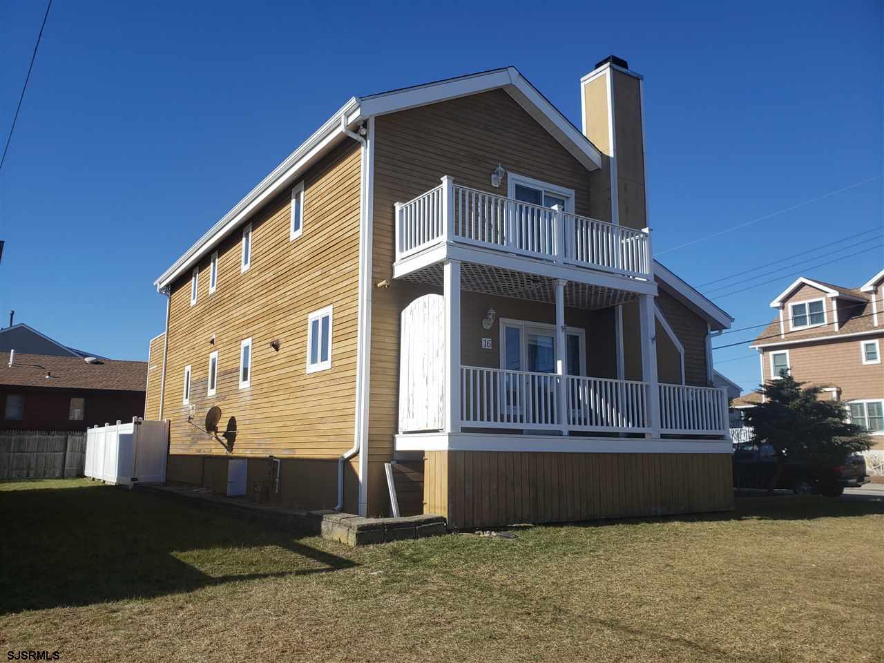 16 Vardon Road Brigantine, NJ 08203 - Photo 3 of 20 a front view of a house with a yard