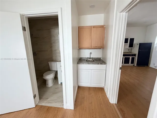 a bathroom with a sink and a toilet