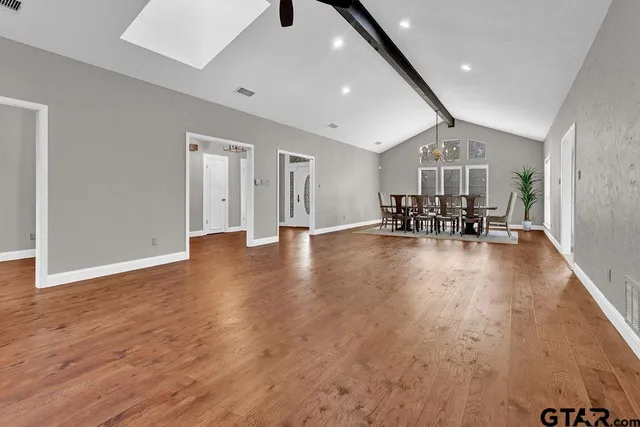 a view of dining room with furniture and wooden floor