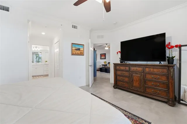 a room with furniture and flat screen tv