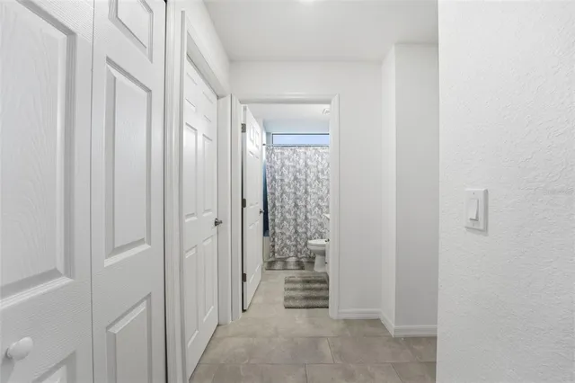 a view of a bathroom with shower