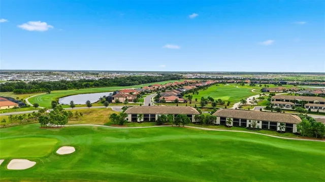 a view of a big yard with large trees