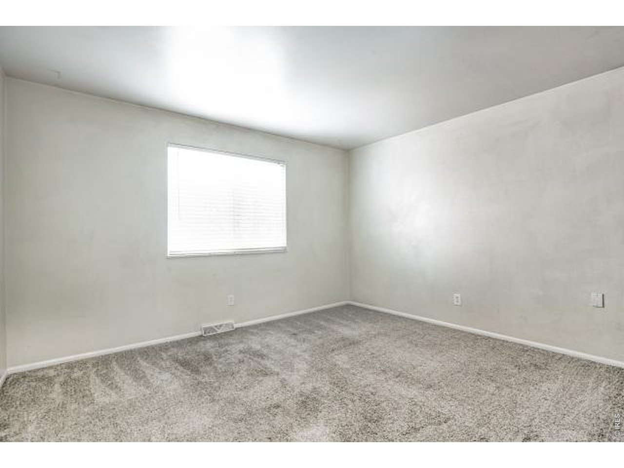 10748 Routt Street Broomfield, CO 80021 - Photo 16 of 30 an empty room with a window
