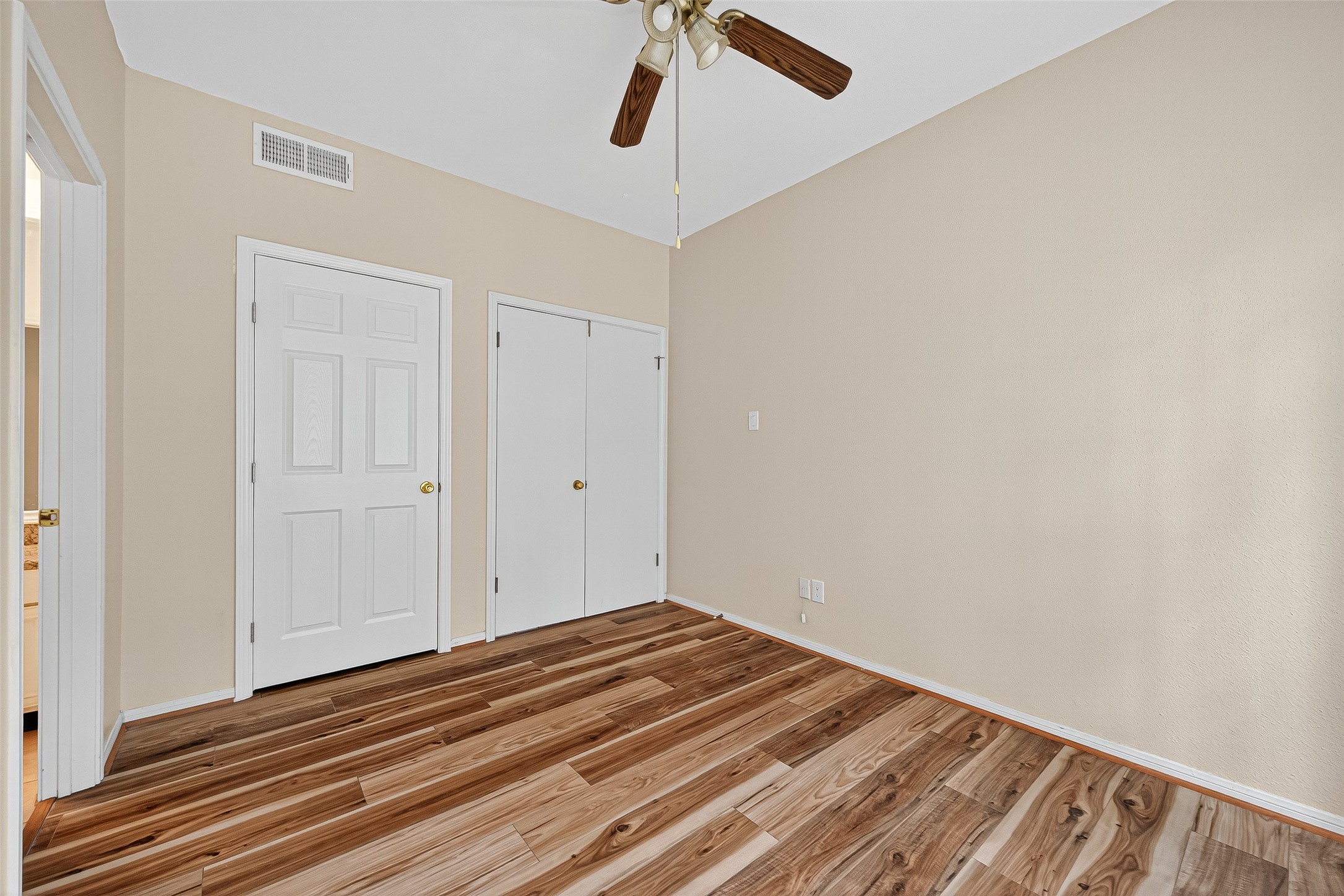 8055 Cambridge Street, Unit 89 Houston, TX 77054 - Photo 18 of 33 a view of a room with wooden floor