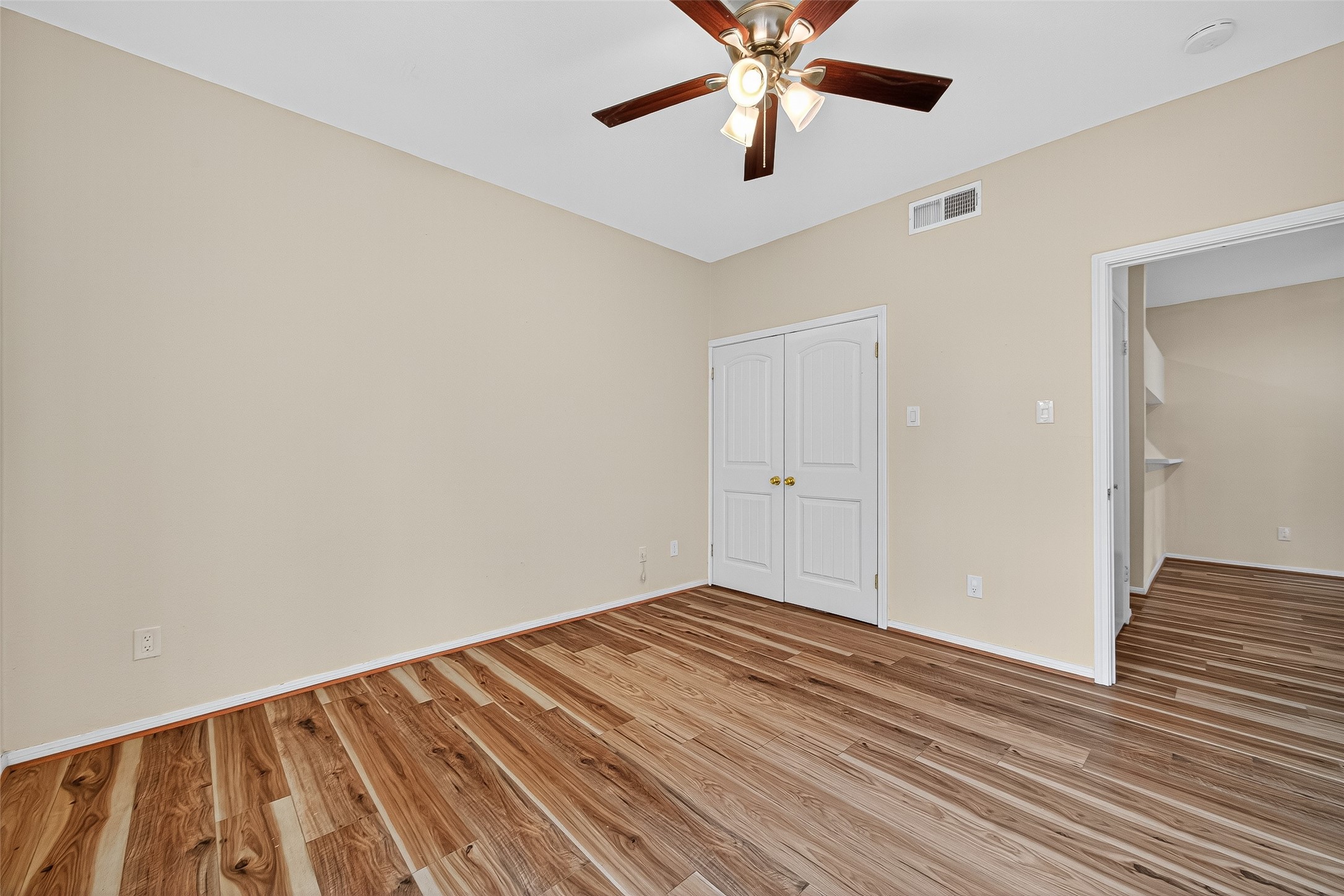8055 Cambridge Street, Unit 89 Houston, TX 77054 - Photo 27 of 33 wooden floor in an empty room