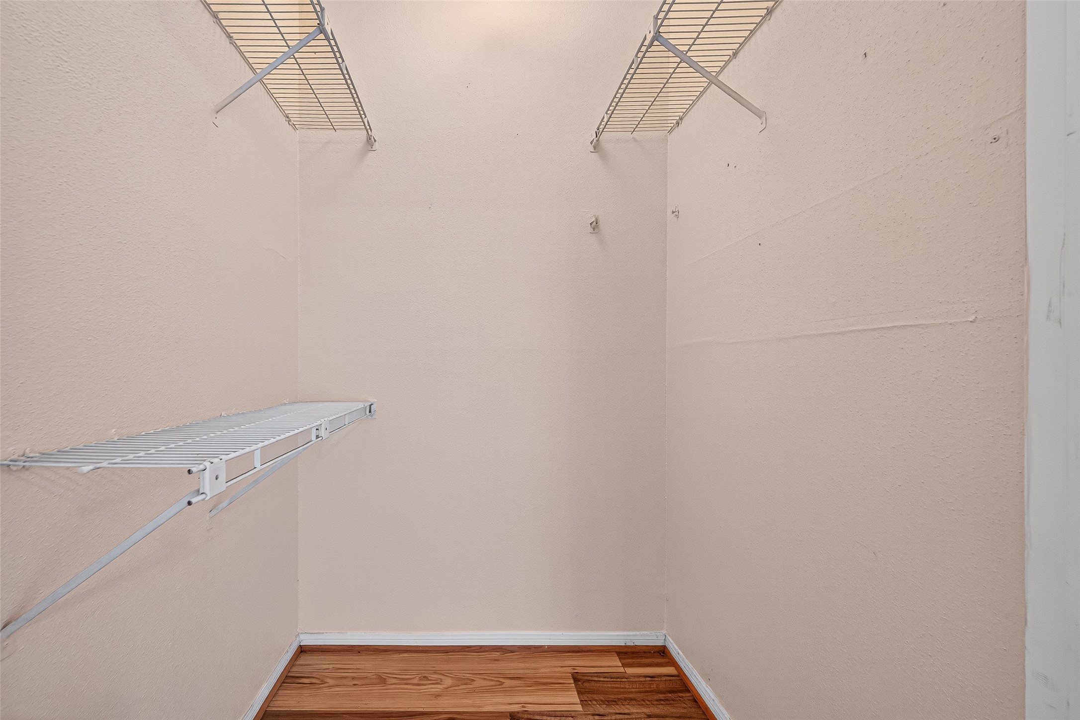 8055 Cambridge Street, Unit 89 Houston, TX 77054 - Photo 29 of 33 a view of small space with empty racks on the wall