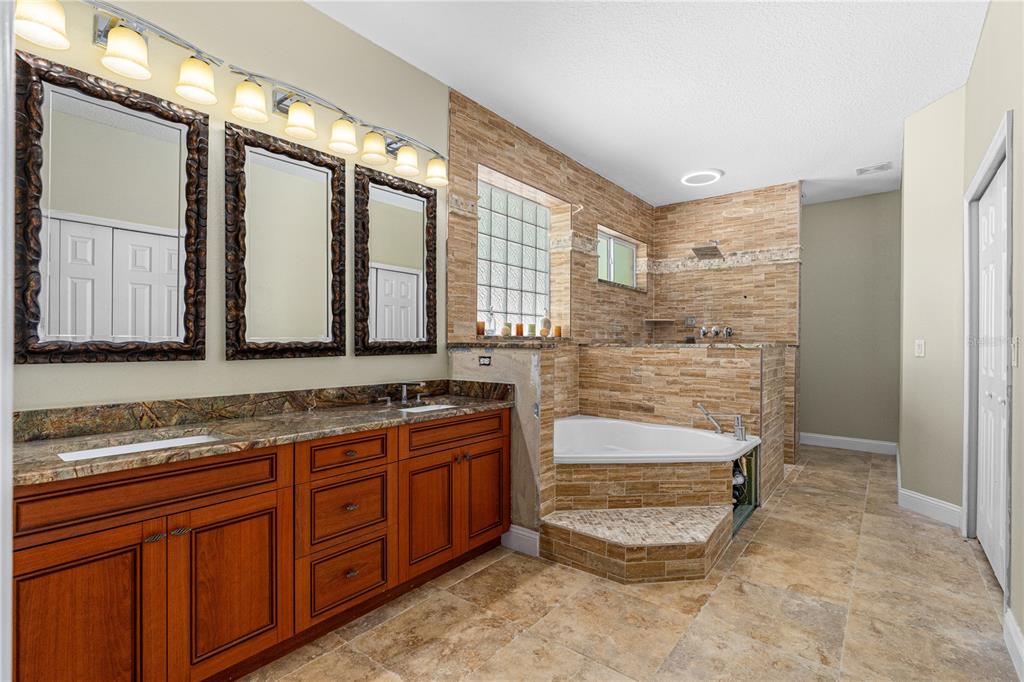 32 Seneca Path Palm Coast, FL 32164 - Photo 30 of 50 a bathroom with a sink and a mirror