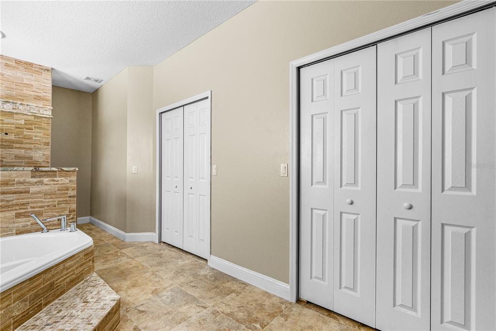 32 Seneca Path Palm Coast, FL 32164 - Photo 31 of 50 a view of a bedroom with furniture and window