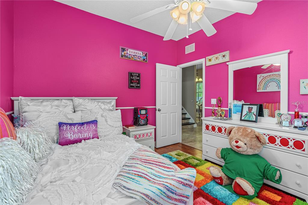 32 Seneca Path Palm Coast, FL 32164 - Photo 37 of 50 a bedroom with a bed and a couch