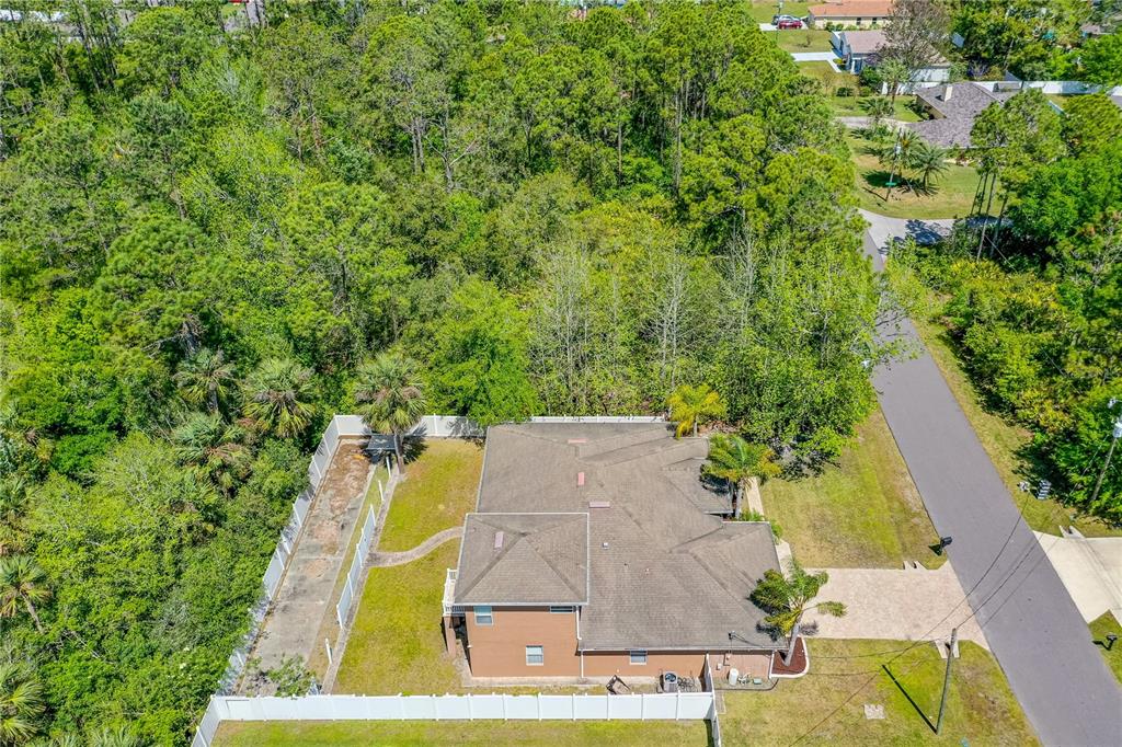 32 Seneca Path Palm Coast, FL 32164 - Photo 49 of 50 an aerial view of a residential houses with yard