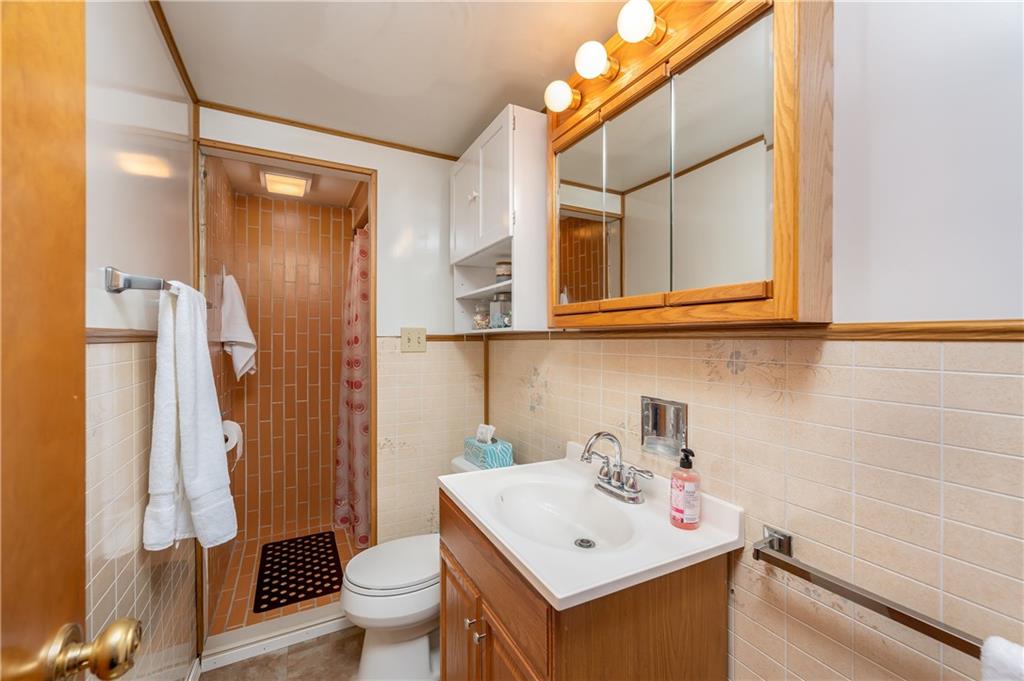 114 Weitzel Road Butler, PA 16002 - Photo 12 of 25 a bathroom with a sink toilet and shower