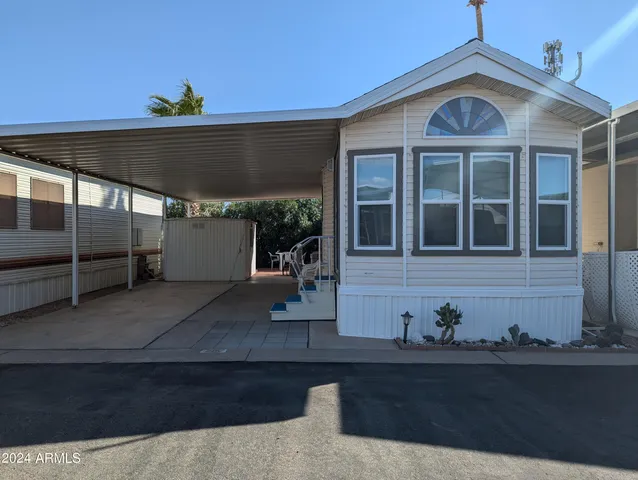 a front view of a house with garage