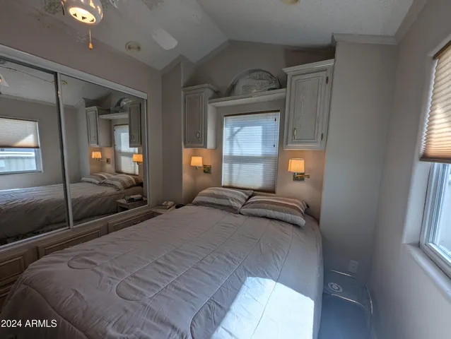 a view of a chairs and table in patio