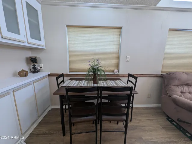 a open kitchen with a table and chairs