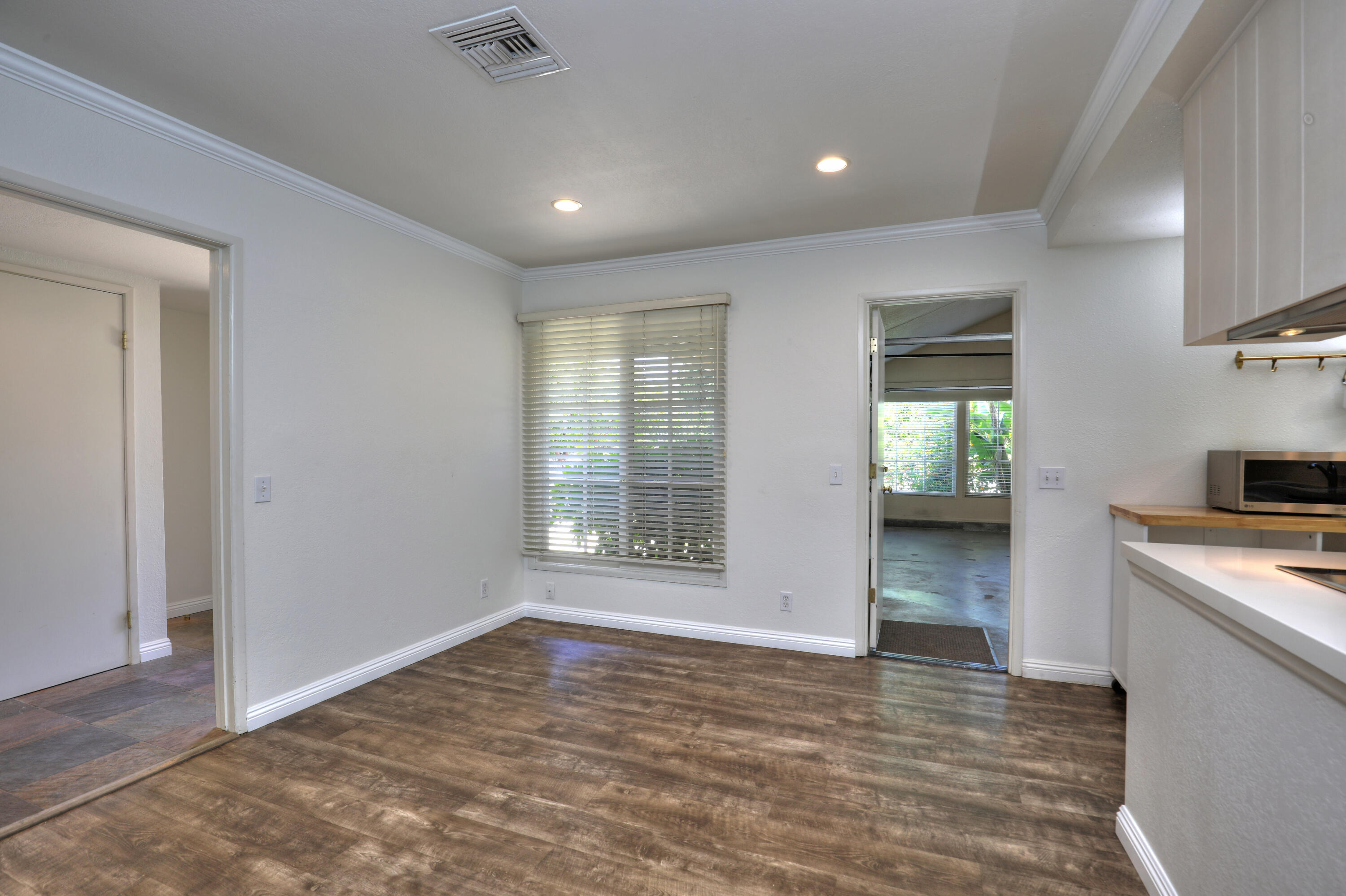 488 Wakefield Road Goleta, CA 93117 - Photo 13 of 34 a view of an empty room with a window and wooden floor