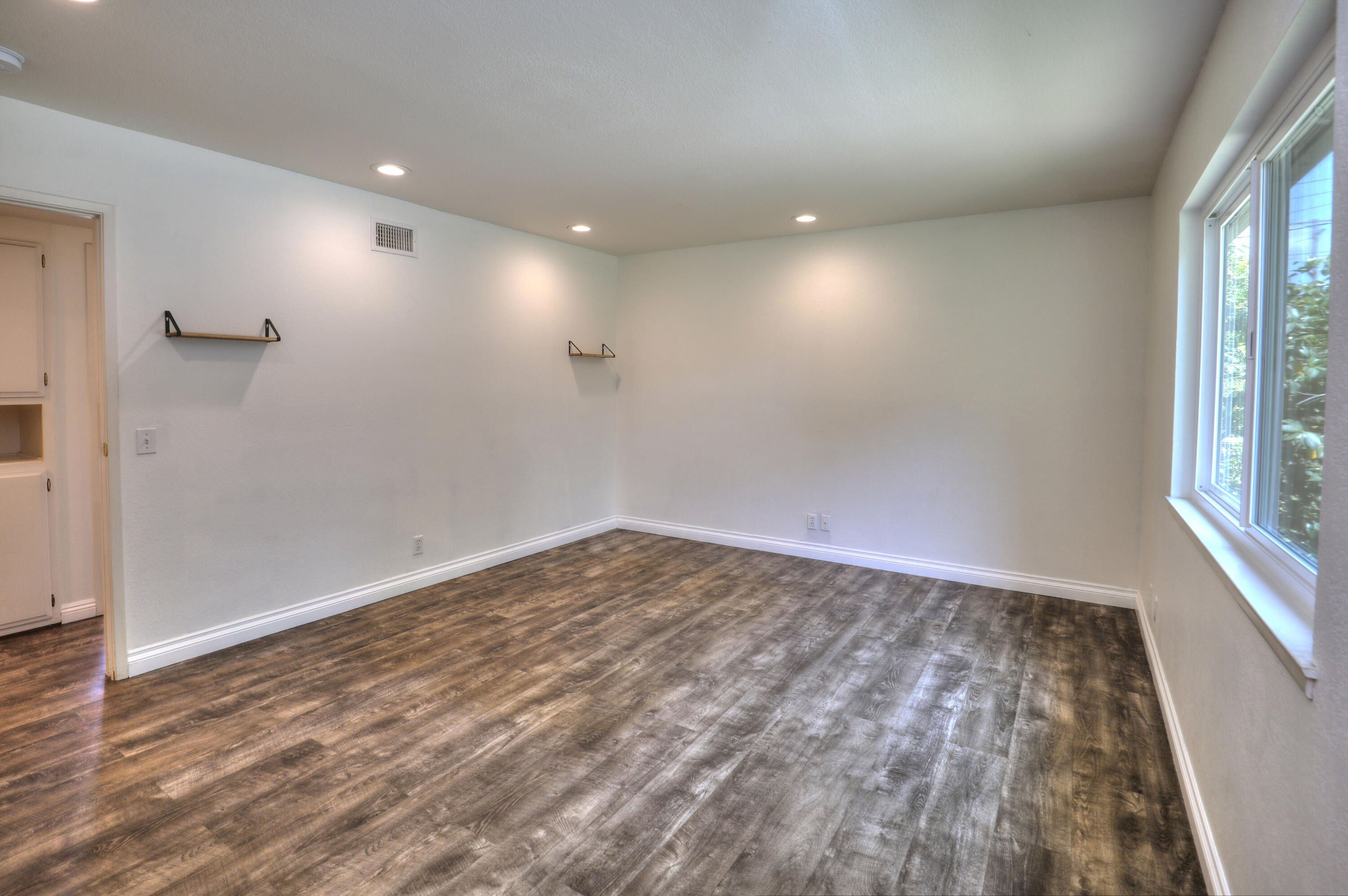 488 Wakefield Road Goleta, CA 93117 - Photo 19 of 34 wooden floor in an empty room with a window