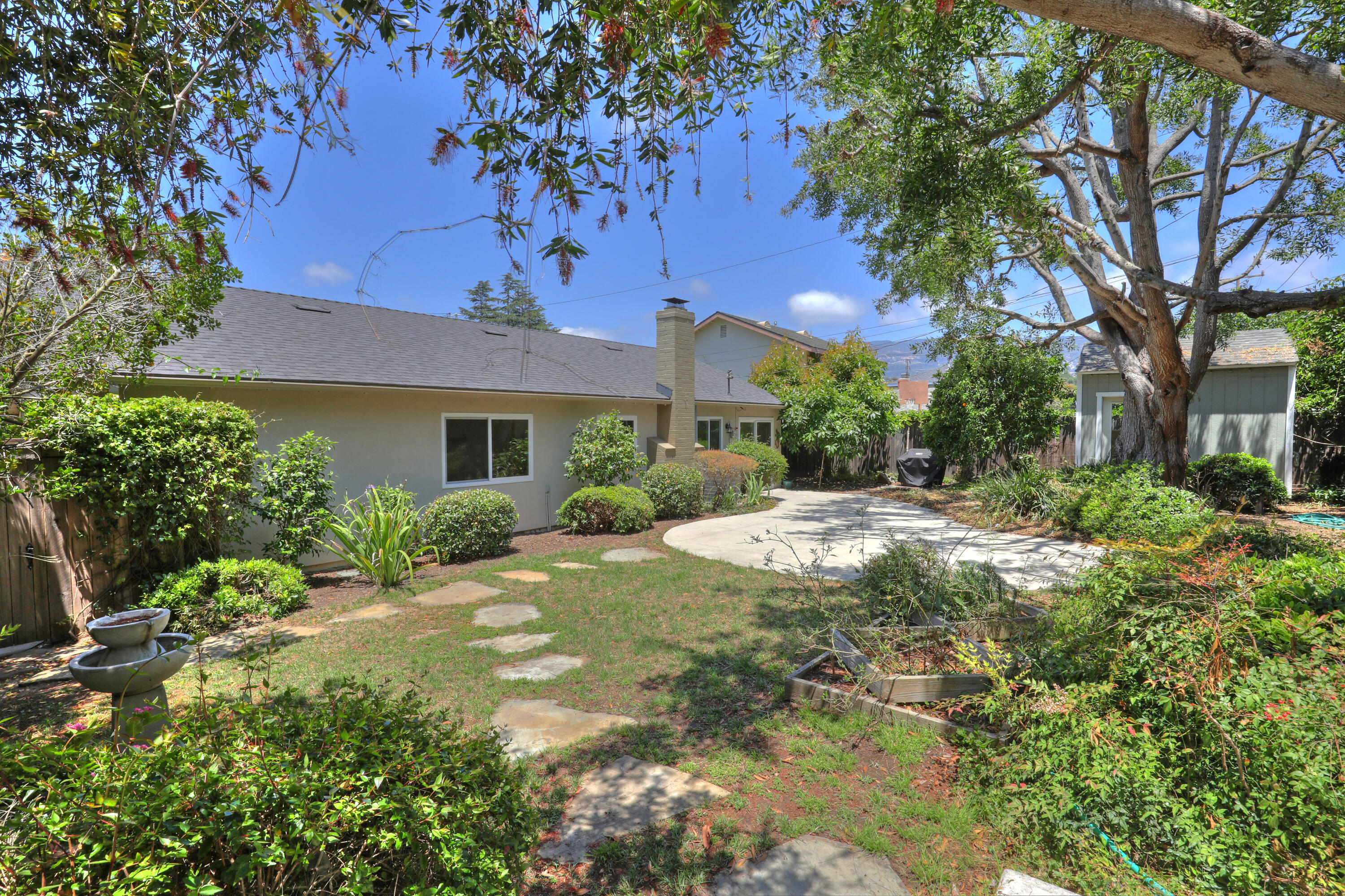 488 Wakefield Road Goleta, CA 93117 - Photo 26 of 34 a view of a house with a tree in the yard