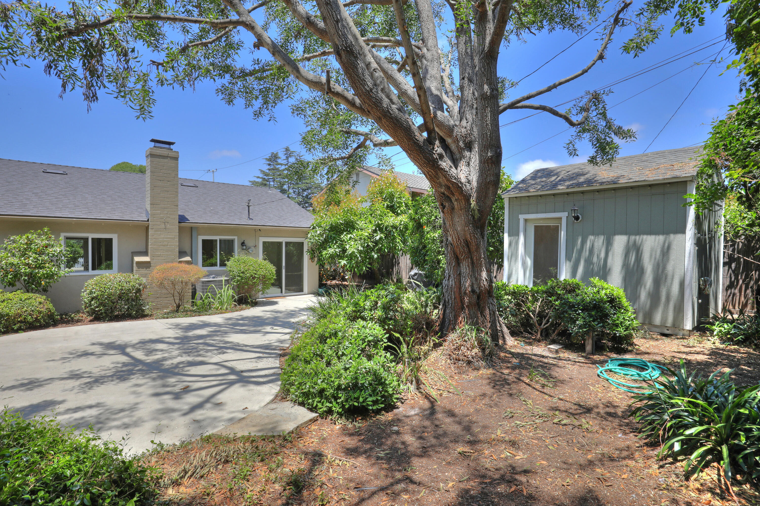 488 Wakefield Road Goleta, CA 93117 - Photo 28 of 34 a front view of a house with a yard and potted plants