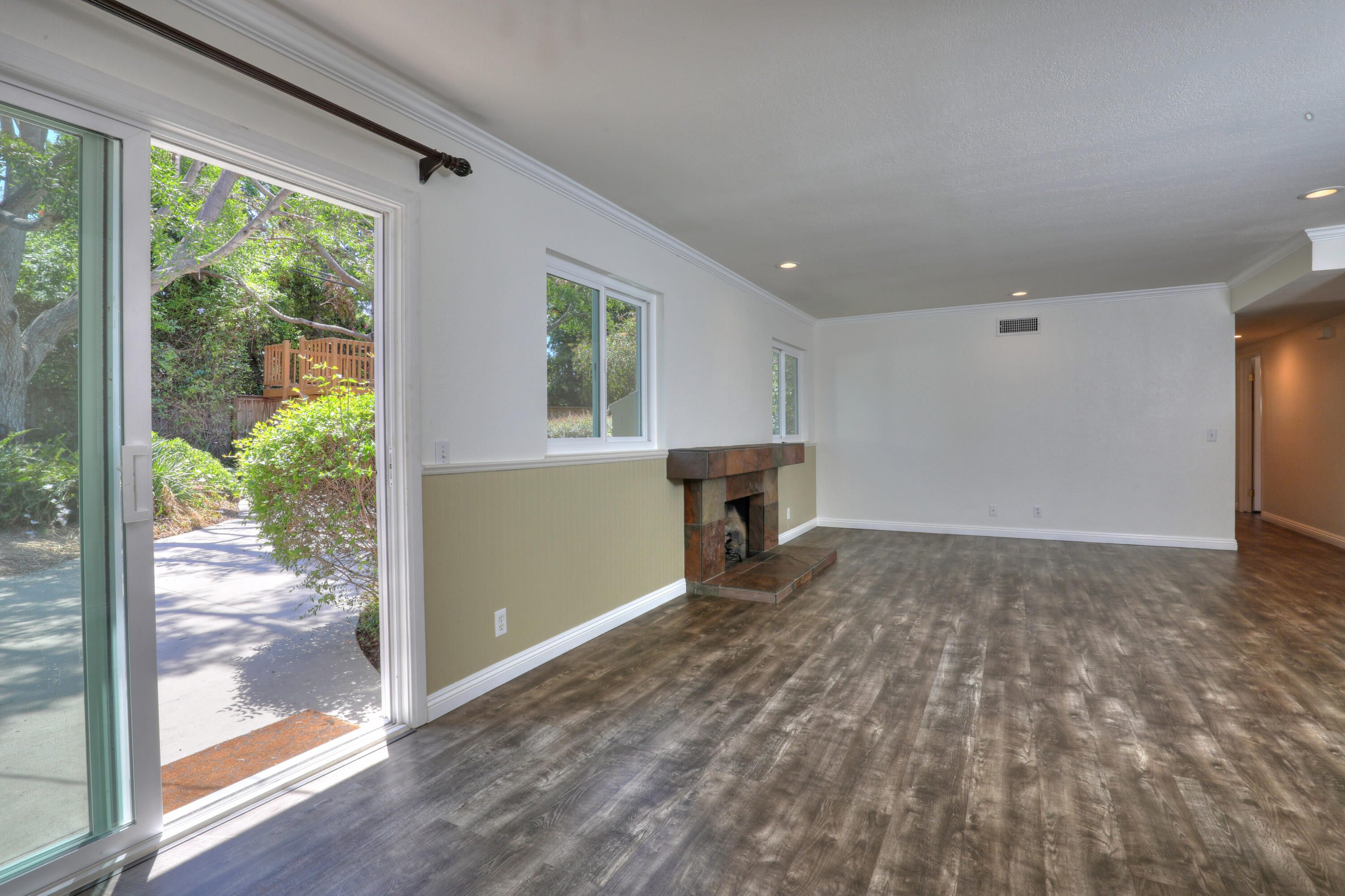 488 Wakefield Road Goleta, CA 93117 - Photo 7 of 34 a view of empty room with wooden floor and fan