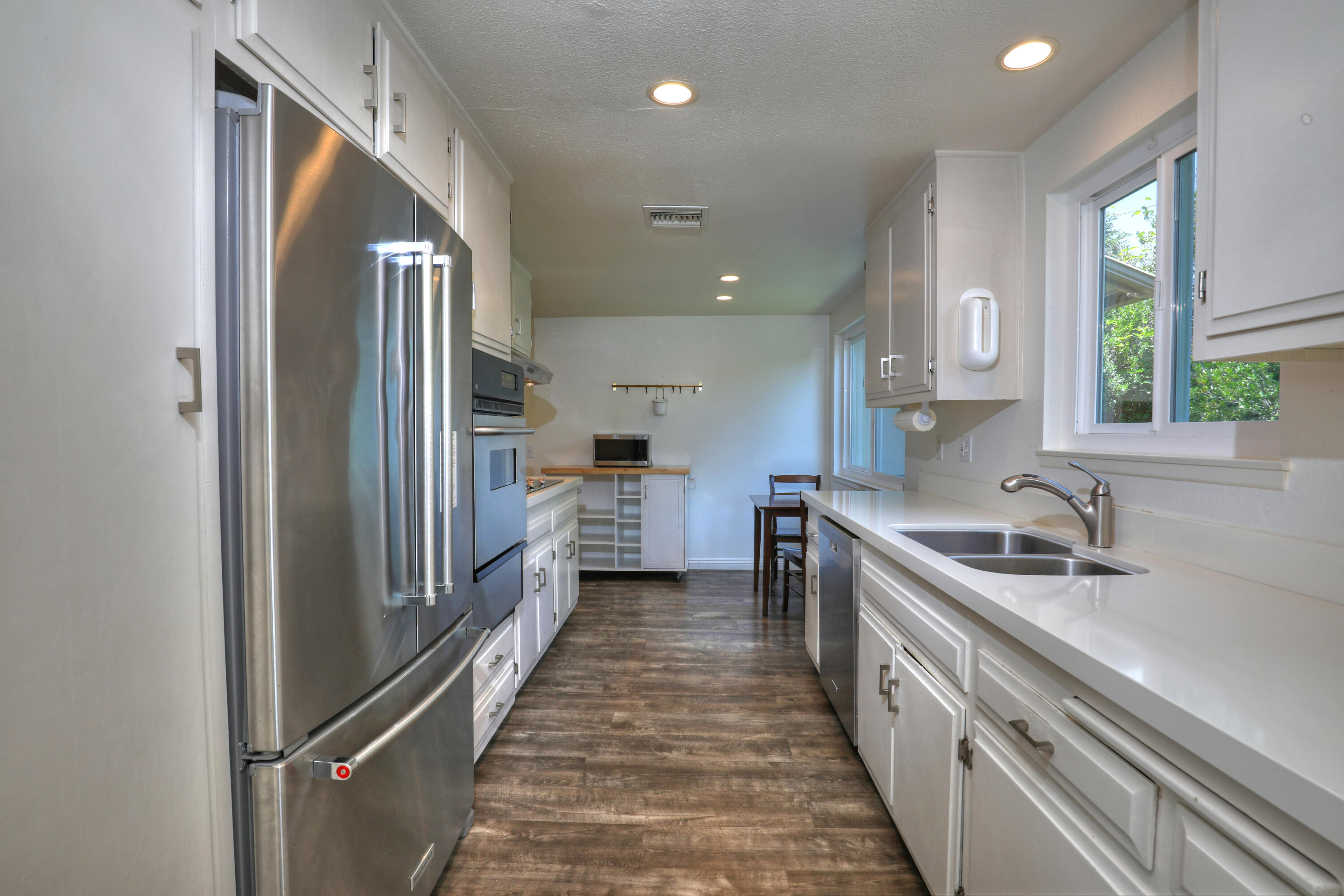 488 Wakefield Road Goleta, CA 93117 - Photo 9 of 34 a kitchen with granite countertop a sink and cabinets