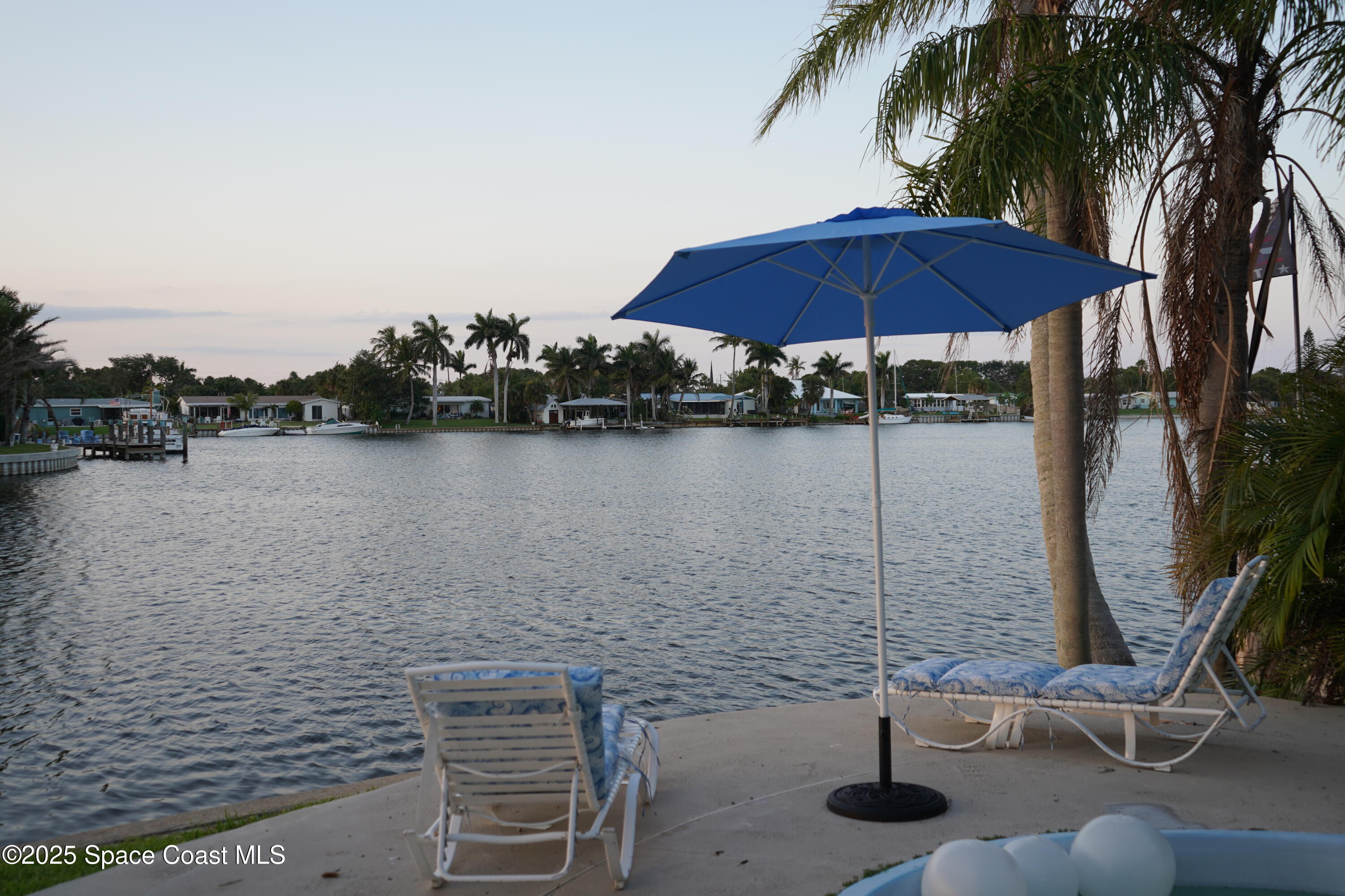 345 South Point Court Satellite Beach, FL 32937 - Photo 24 of 27 a view of a lake with outside space