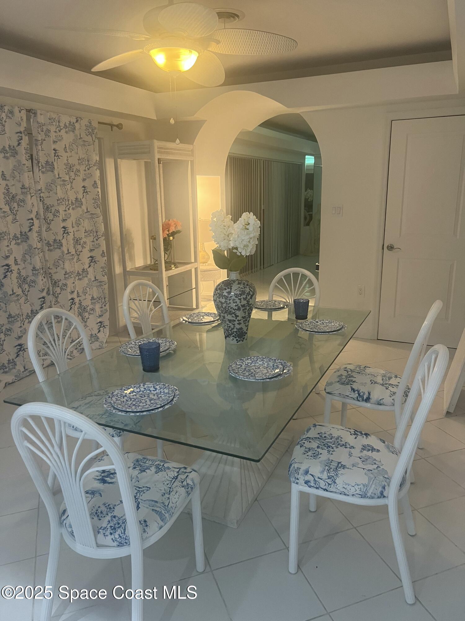 345 South Point Court Satellite Beach, FL 32937 - Photo 10 of 27 a view of a dining room with furniture