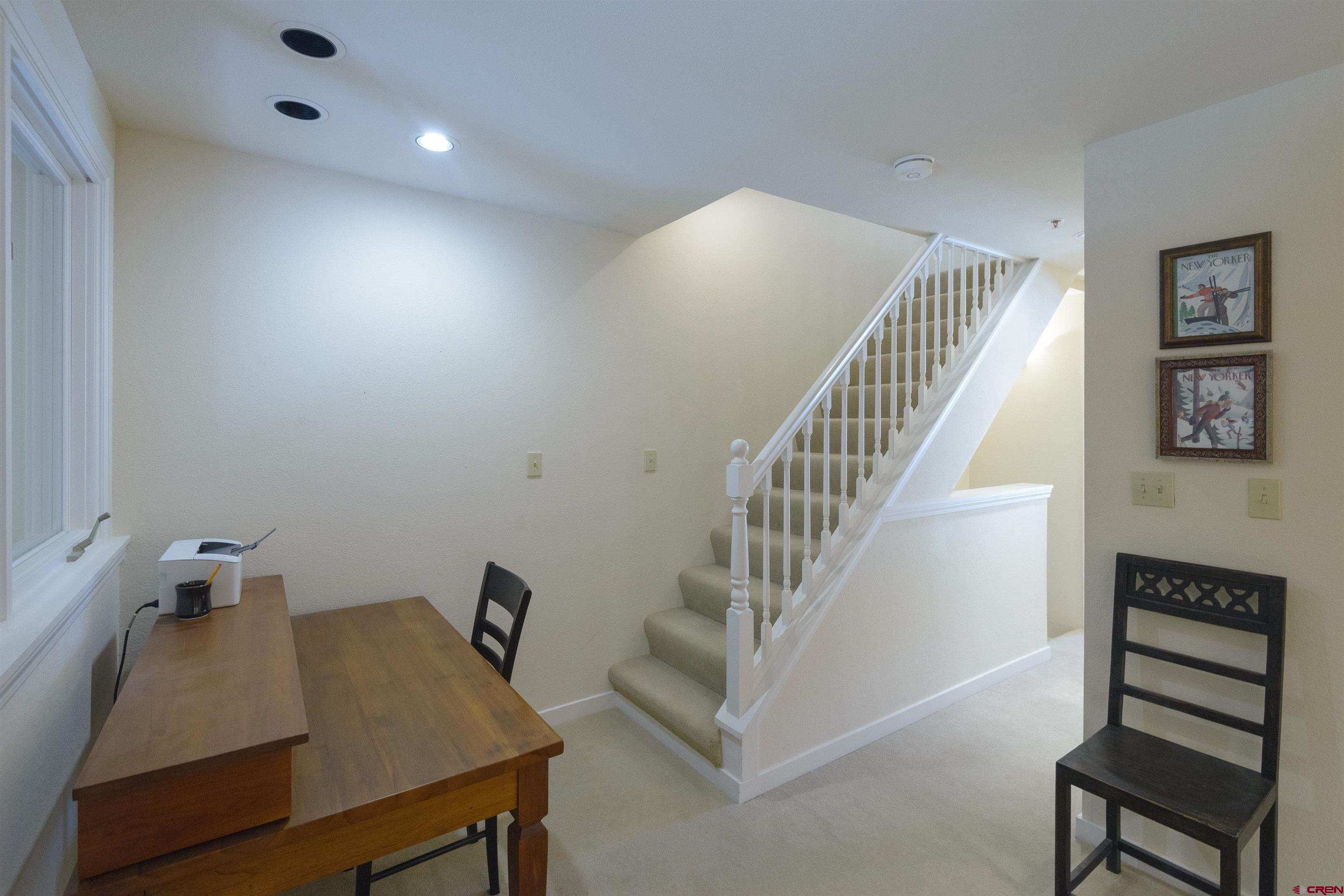12 Snowmass Road, Unit 416 Crested Butte, CO 81225 - Photo 22 of 35 a view of entryway and hall with a dining room