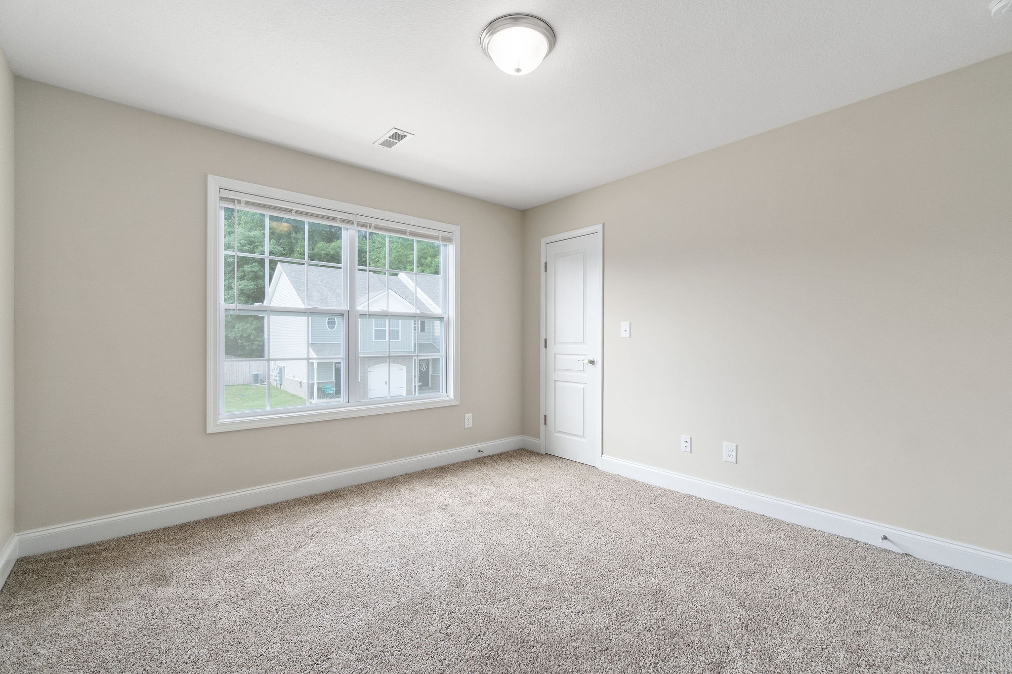 1552 Tylertown Road, Unit 302 Clarksville, TN 37040 - Photo 23 of 24 an empty room with a window
