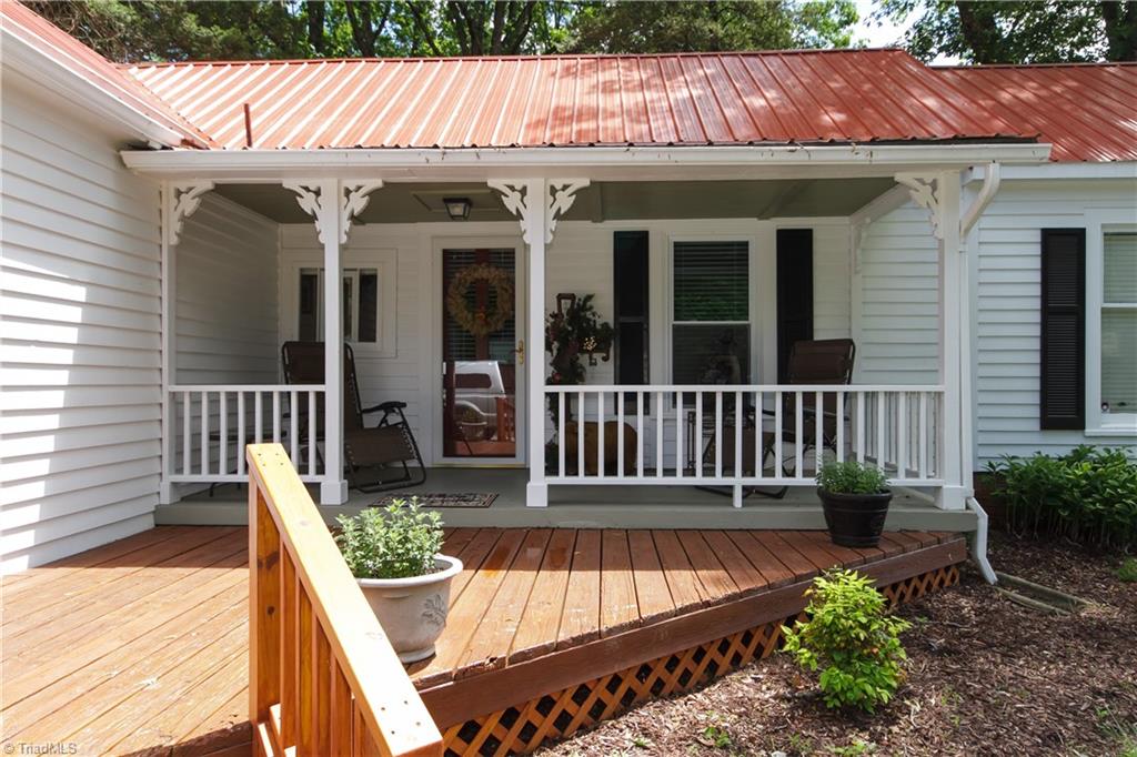 665 Isley Road Haw River, NC 27258 - Photo 3 of 29 Covered front and side porch