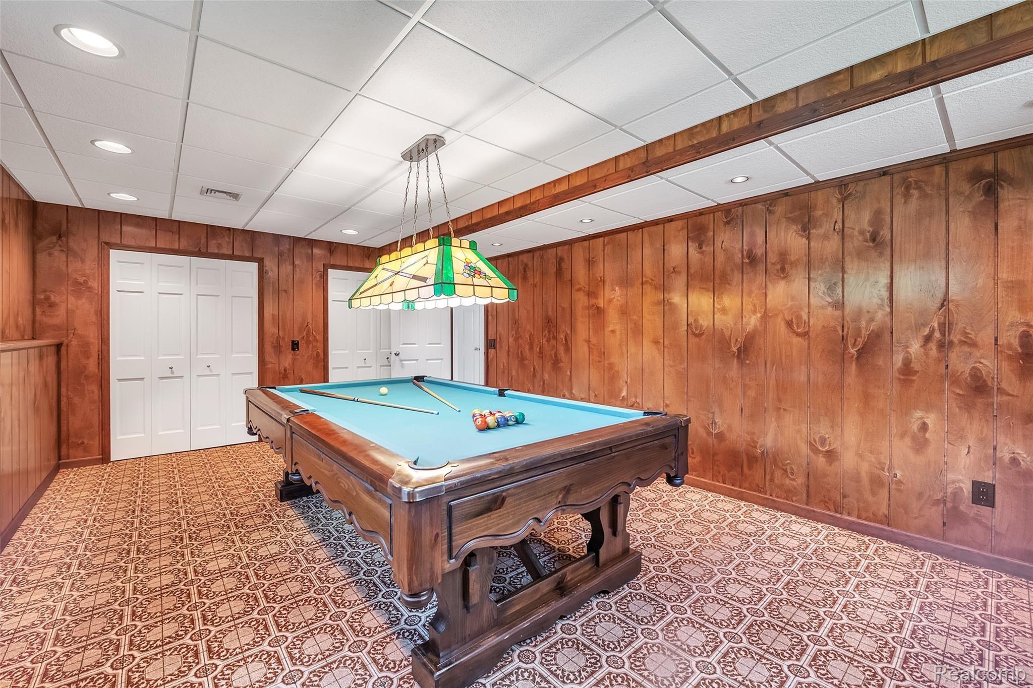 4054 Bennett Lake Road Fenton, MI 48430 - Photo 28 of 57 Recreation Room with Pool Table & Leaded Glass Pool Table Light (Neg) ~ Two Large Storage Closets