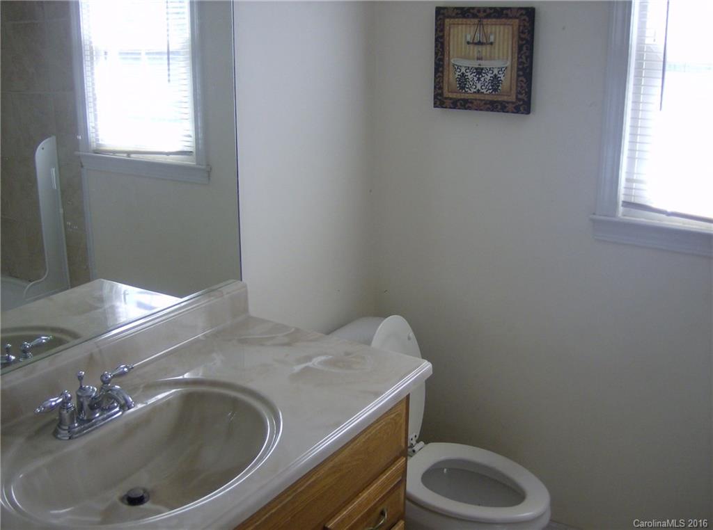 111 Fleetwood Road York, SC 29745 - Photo 13 of 23 a bathroom with a sink and a toilet
