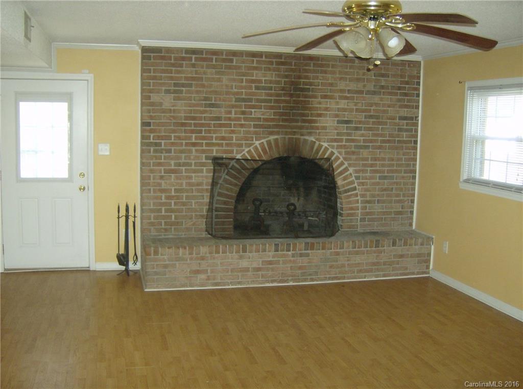 111 Fleetwood Road York, SC 29745 - Photo 4 of 23 a room with a fireplace
