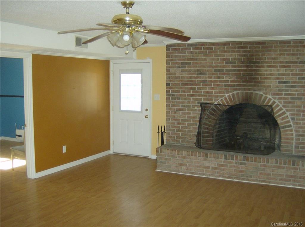 111 Fleetwood Road York, SC 29745 - Photo 5 of 23 a living room with a fireplace