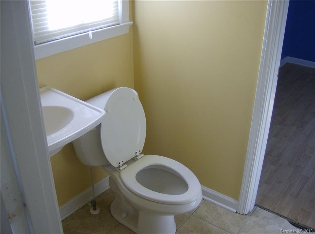 111 Fleetwood Road York, SC 29745 - Photo 6 of 23 a bathroom with a toilet and sink