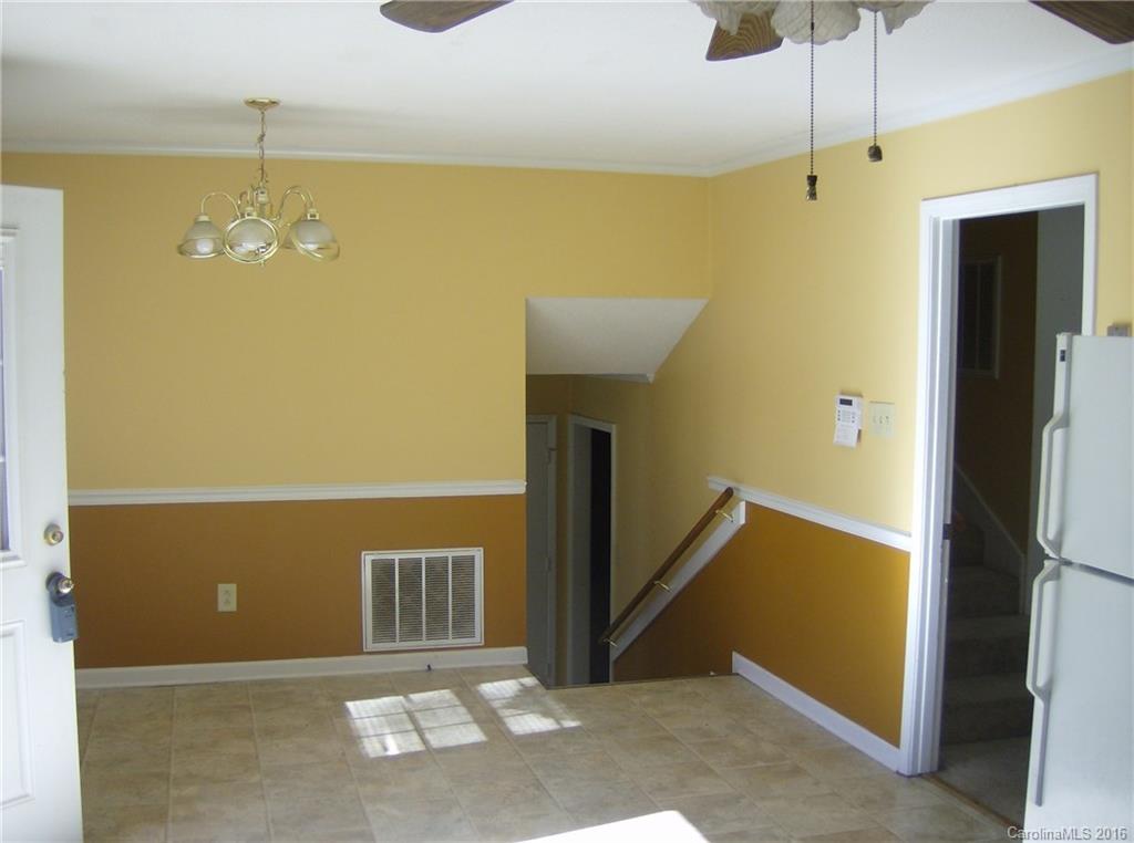 111 Fleetwood Road York, SC 29745 - Photo 10 of 23 a view of a hallway with a yellow space